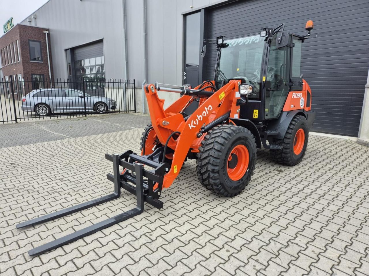Kubota R090 wiellader - Airco - Snelwissel - Bak en Vork