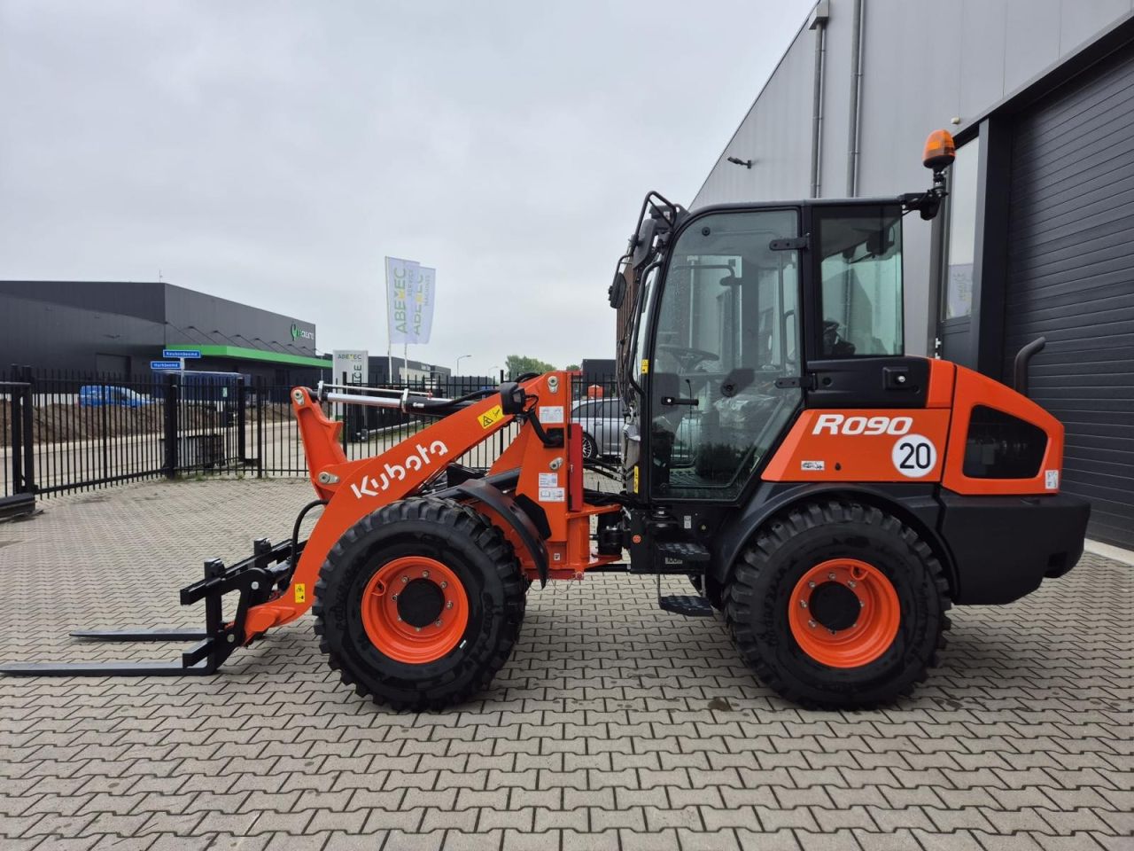 Kubota R090 wiellader - Airco - Snelwissel - Bak en Vork