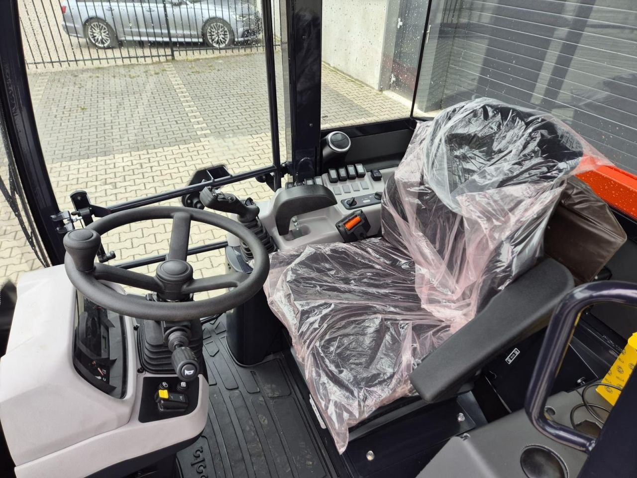 Kubota R090 wiellader - Airco - Snelwissel - Bak en Vork