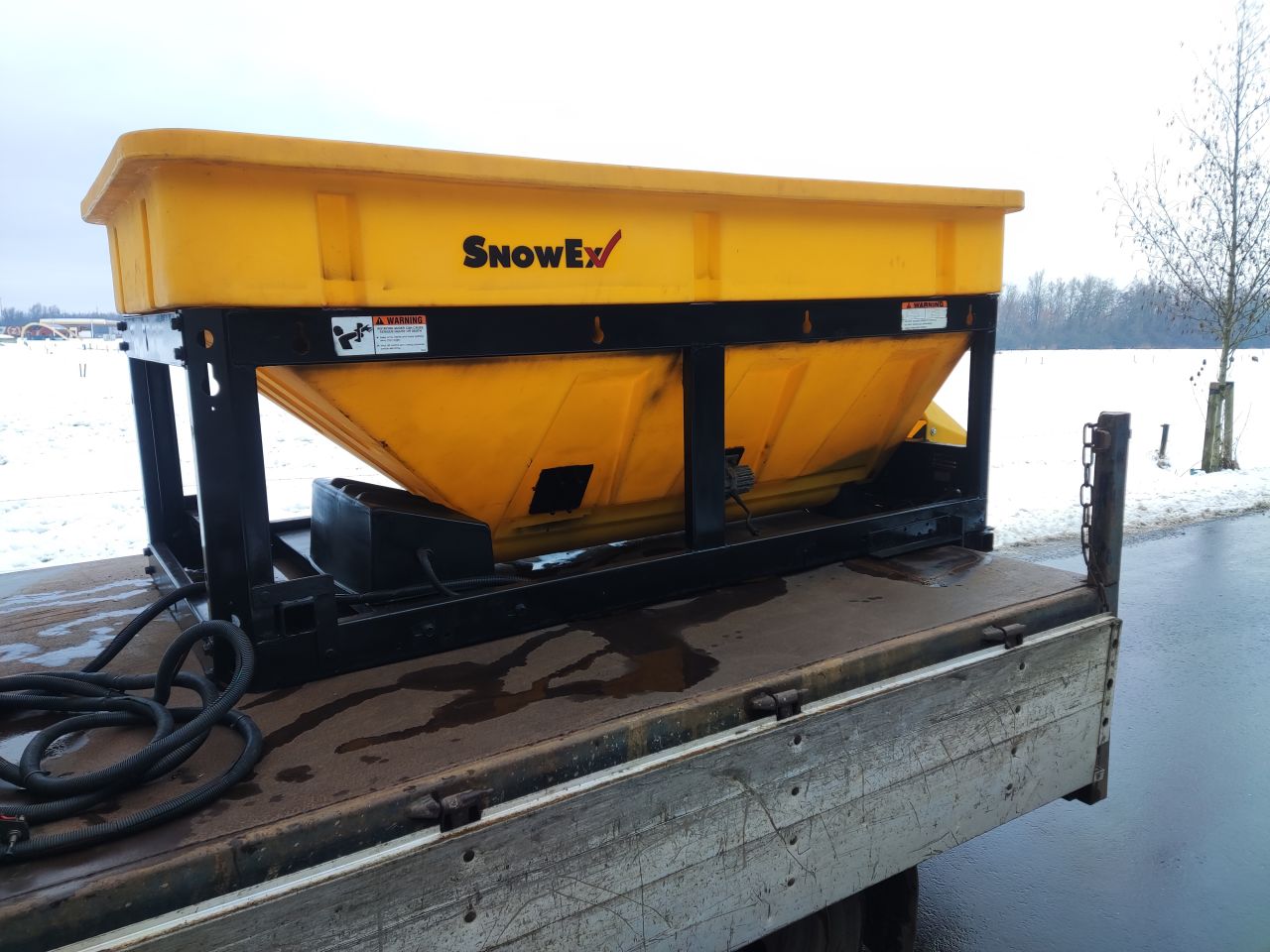SNOWEX (opbouw) zoutstrooier (type SP 8500, 12V, 1.960 kg)