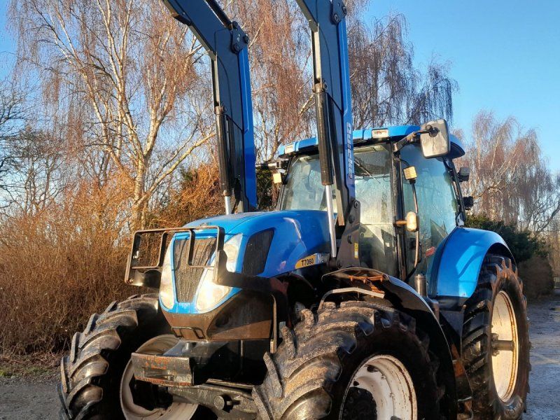 New Holland T7060 Power Shift med ÅLØ Q 76 frontlæsser
