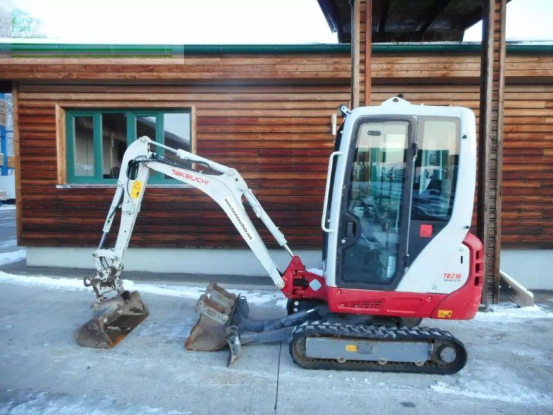 Takeuchi tb 216 ( 1.865kg ) powertilt + 3 löffel