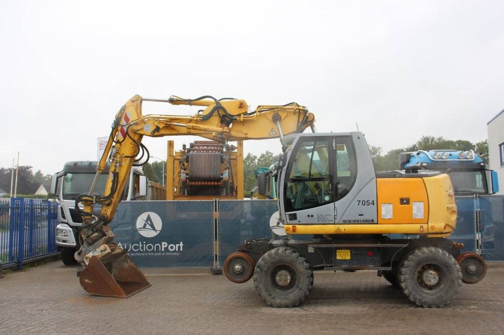 Wheel excavator New Holland MH5 Plus Diesel 2008