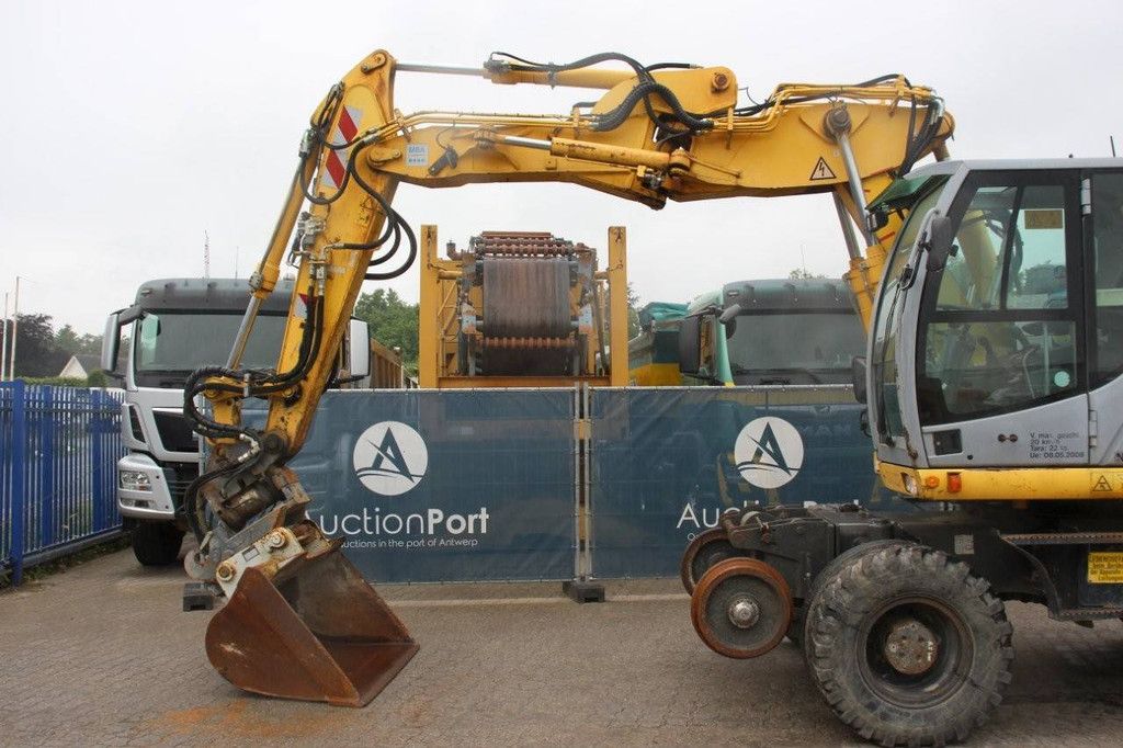 Wheel excavator New Holland MH5 Plus Diesel 2008