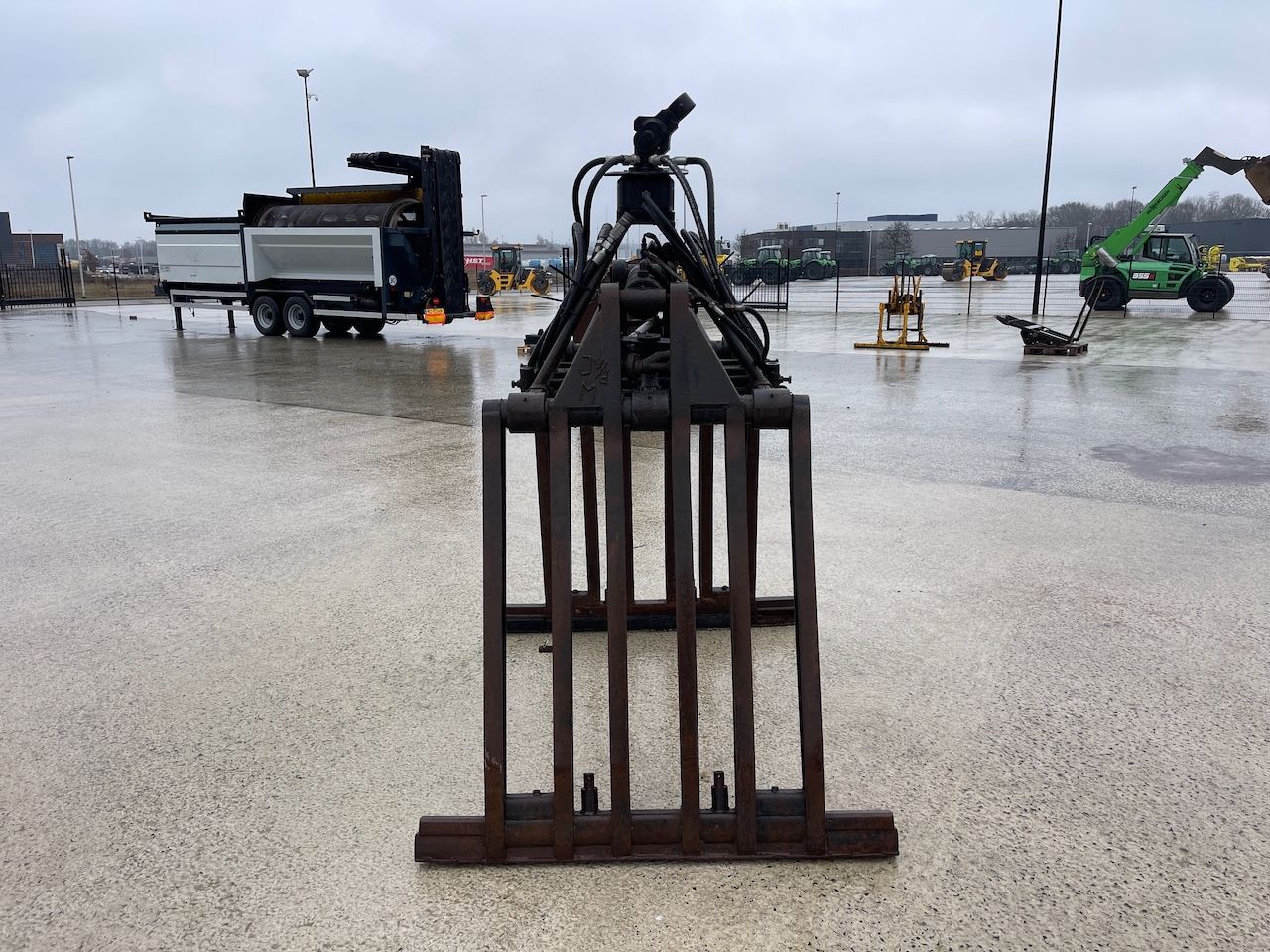 Stenenklem met hydraulische rotator