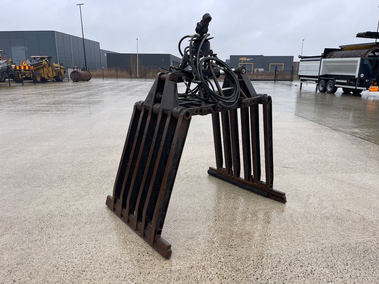 Stenenklem met hydraulische rotator