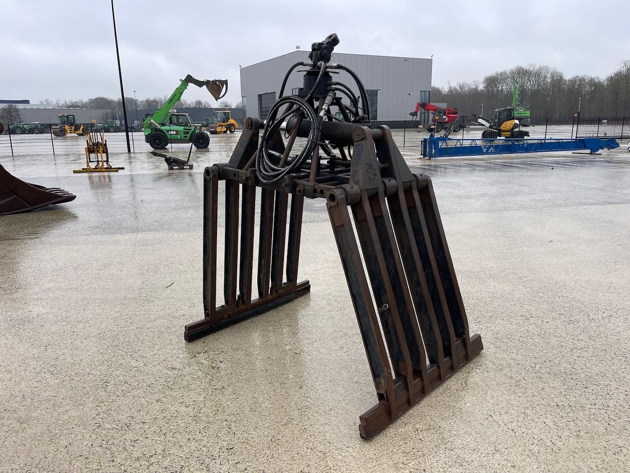 Stenenklem met hydraulische rotator