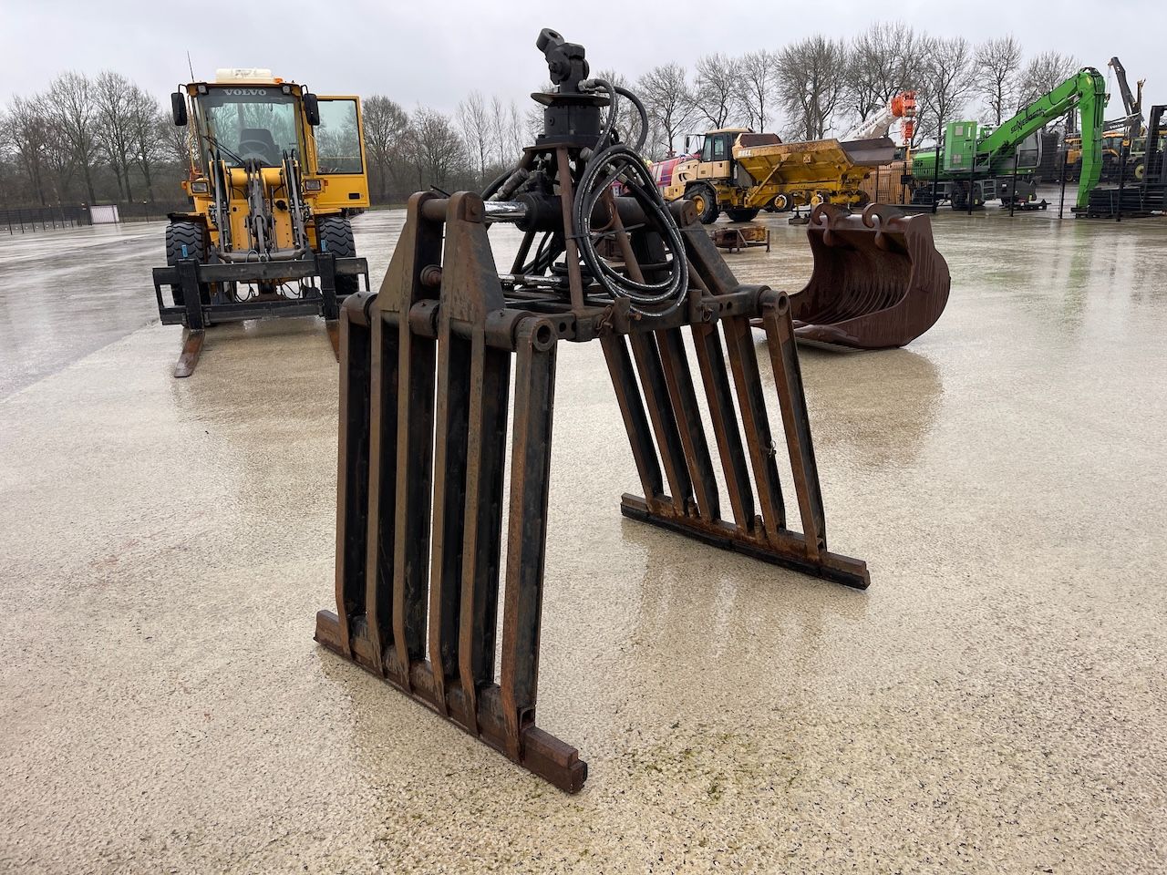 Stenenklem met hydraulische rotator