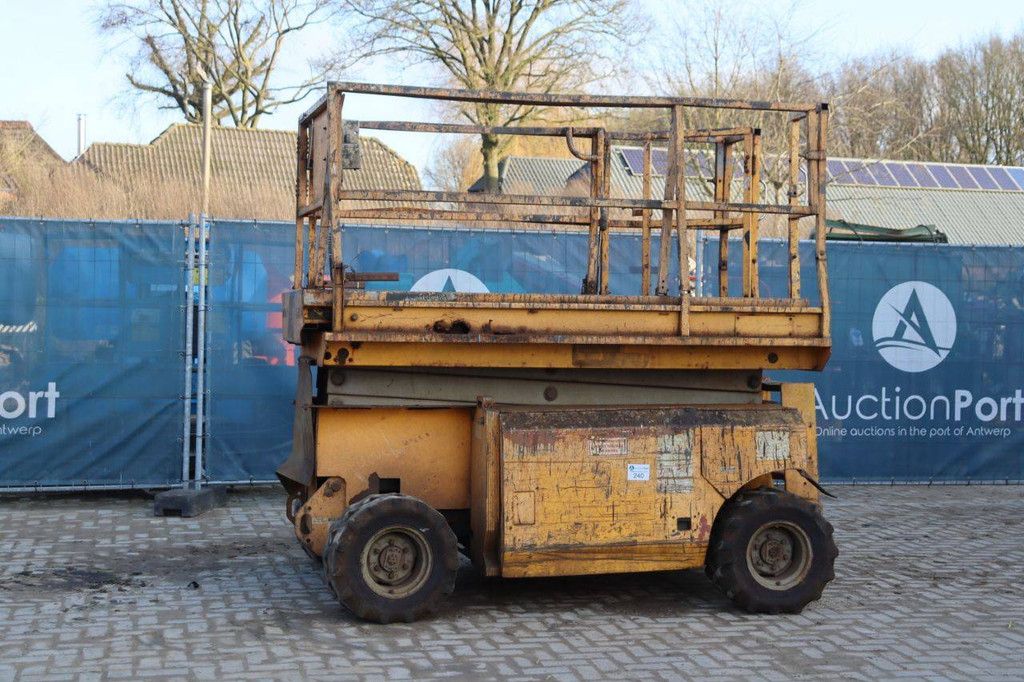 Scissor lift Genie GS-3268 RT Diesel 9.75m 2000