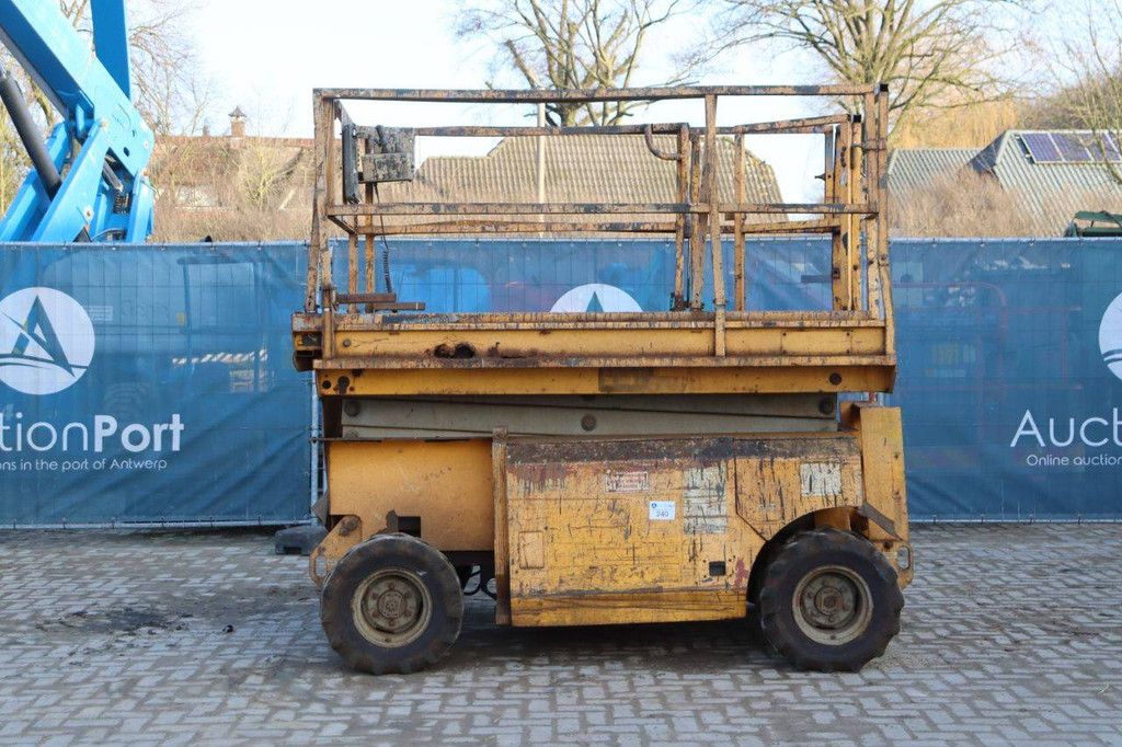 Scissor lift Genie GS-3268 RT Diesel 9.75m 2000