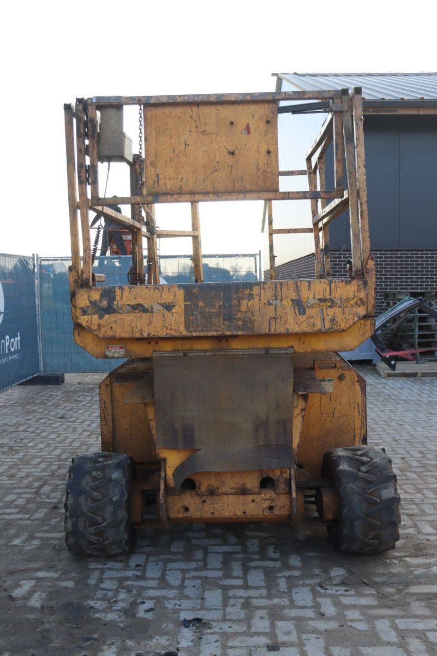 Scissor lift Genie GS-3268 RT Diesel 9.75m 2000