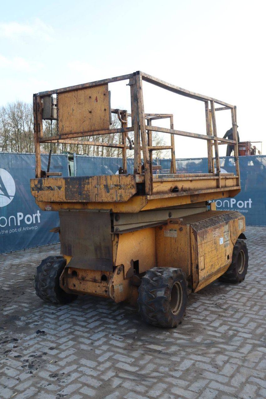 Scissor lift Genie GS-3268 RT Diesel 9.75m 2000