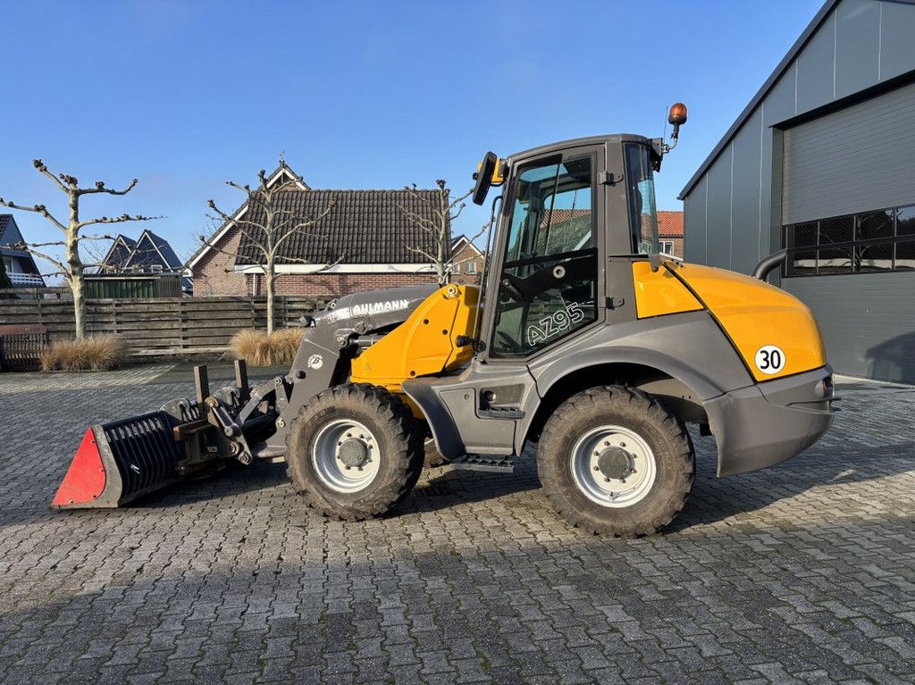 Ahlmann AZ95 met Bak en Lepels.