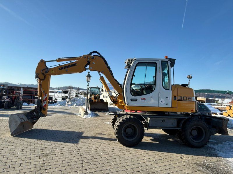 Liebherr A 309 mit Powertilt
