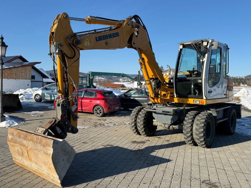 Liebherr A 309 mit Powertilt