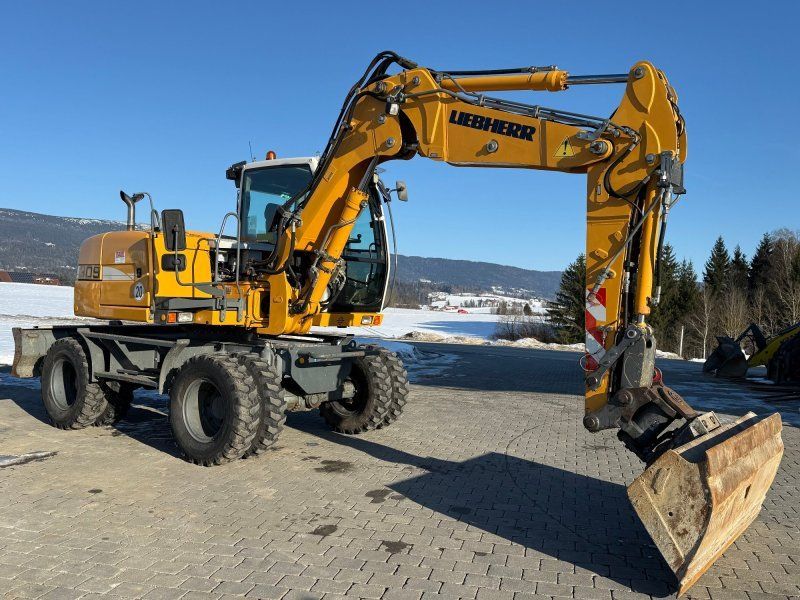 Liebherr A 309 mit Powertilt