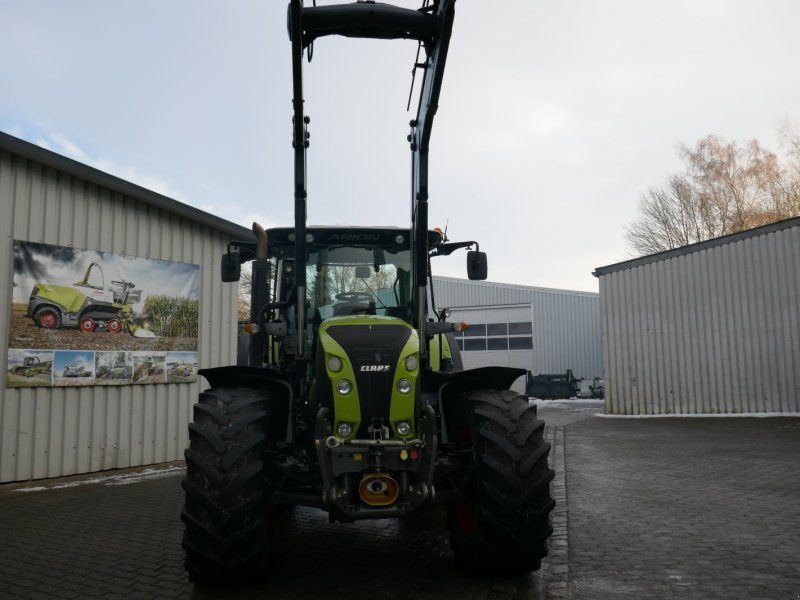 Claas Arion 650 CMATIC mit Quicke Frontlader Q66