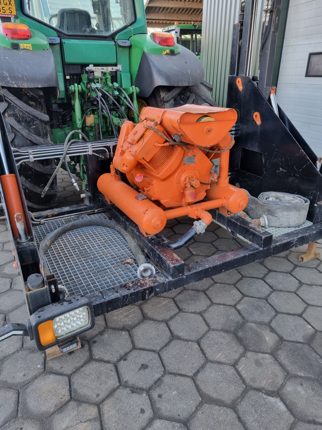 Slangenhaspel met pto aangedreven Compressor. (sleepslang)