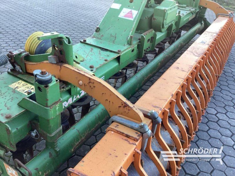 Amazone KE 402 MIT ZAHNPACKERWALZE