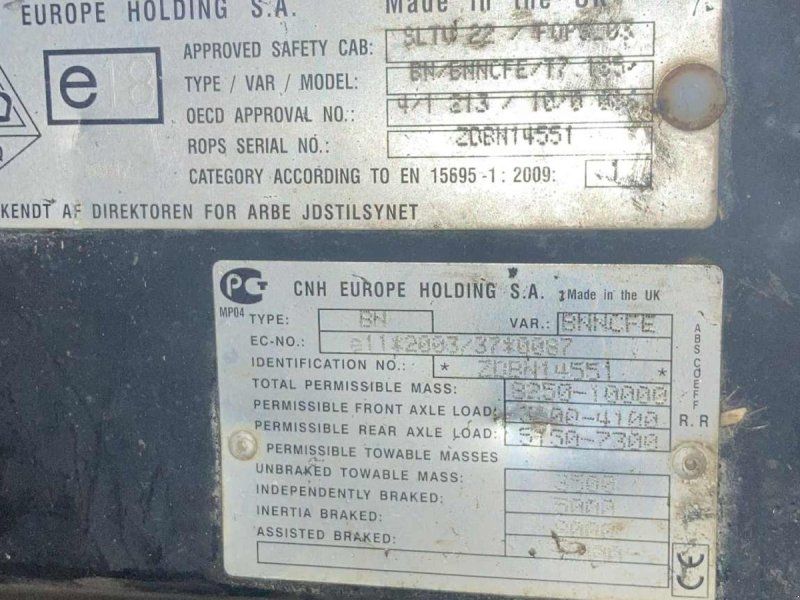 New Holland T7.185 AutoCommand med frontlæsser. Gård som er på vej hj