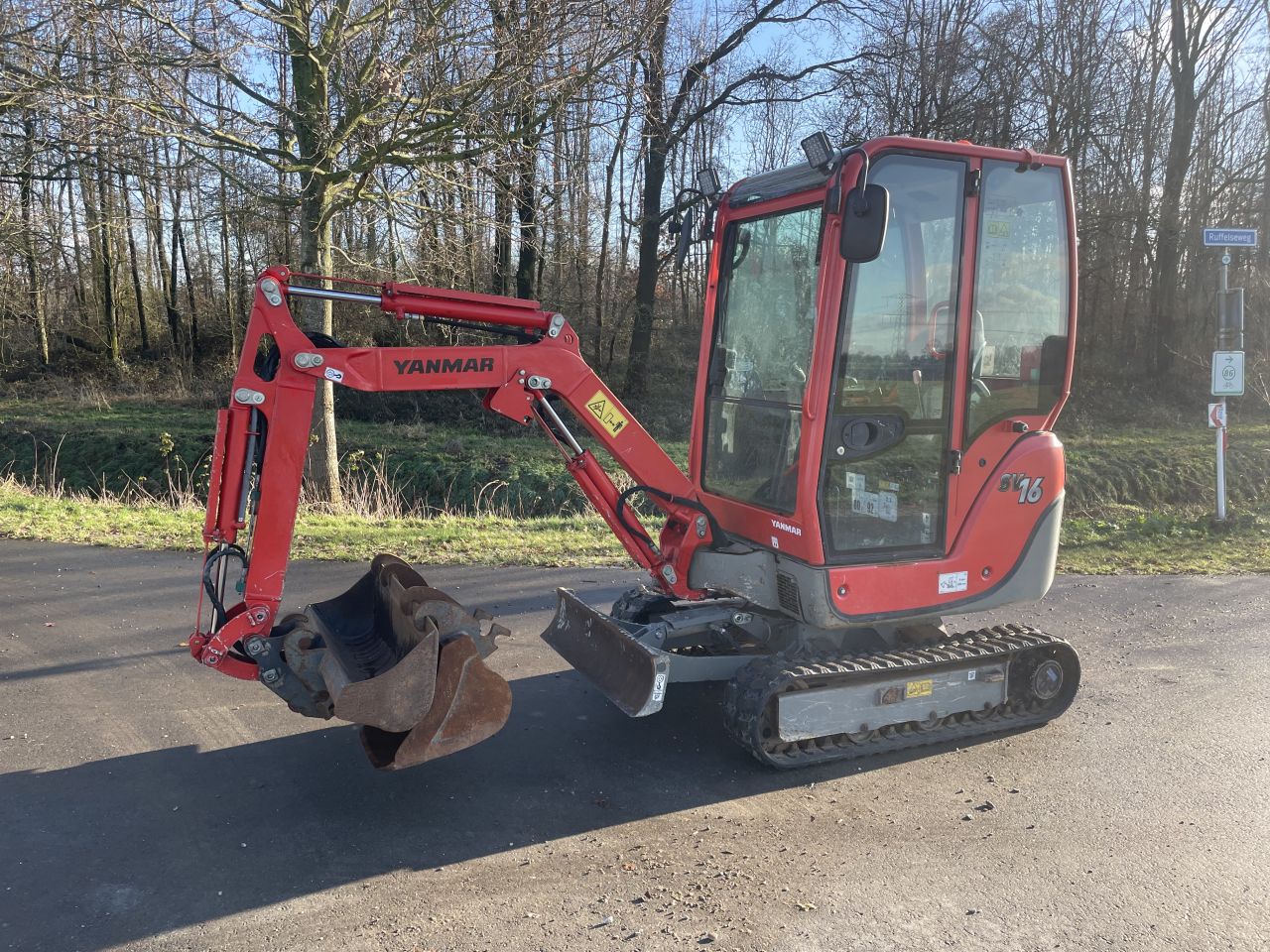 Yanmar SV16 minigraver met Hulco machinetransporter