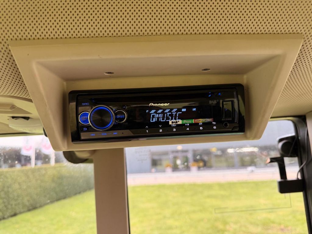 John Deere 6120M MET VOORLADER