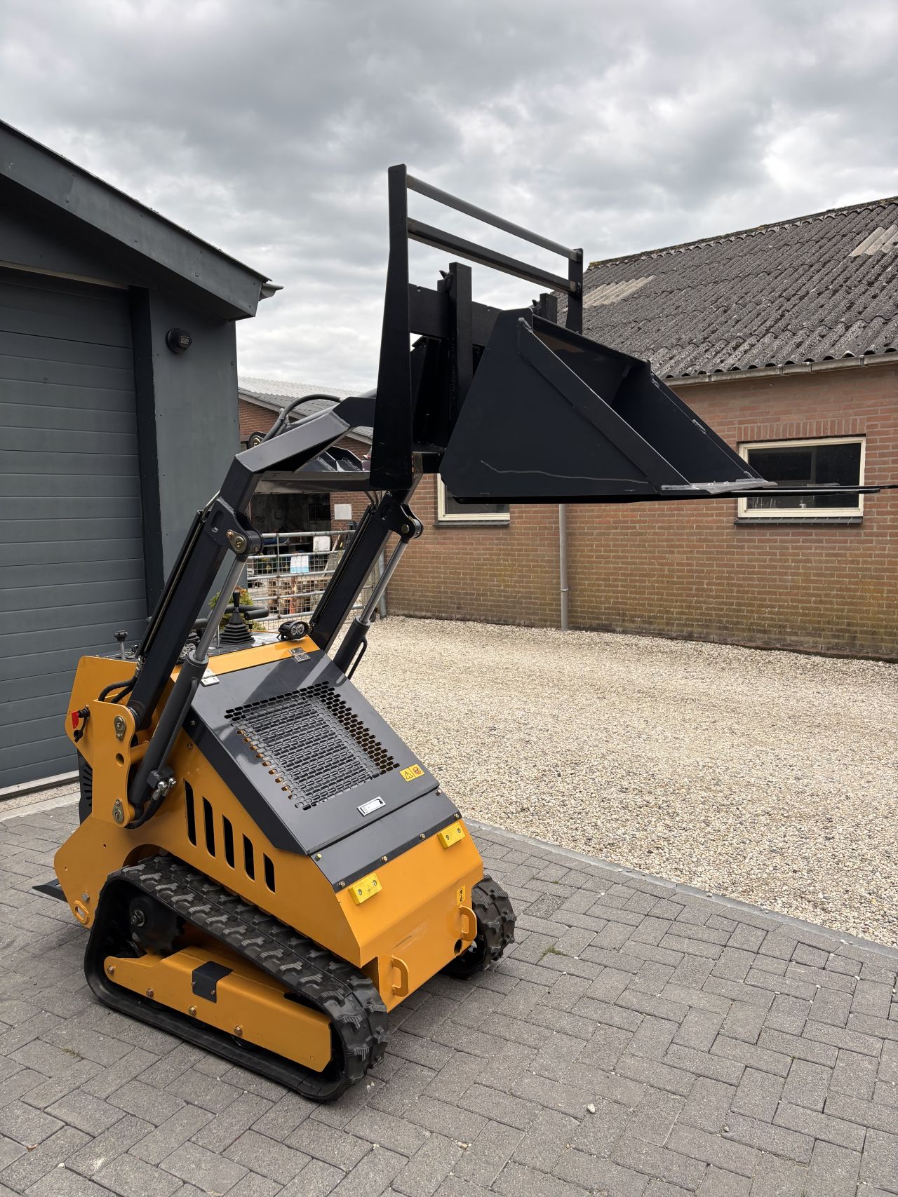 Schranklader skid steer