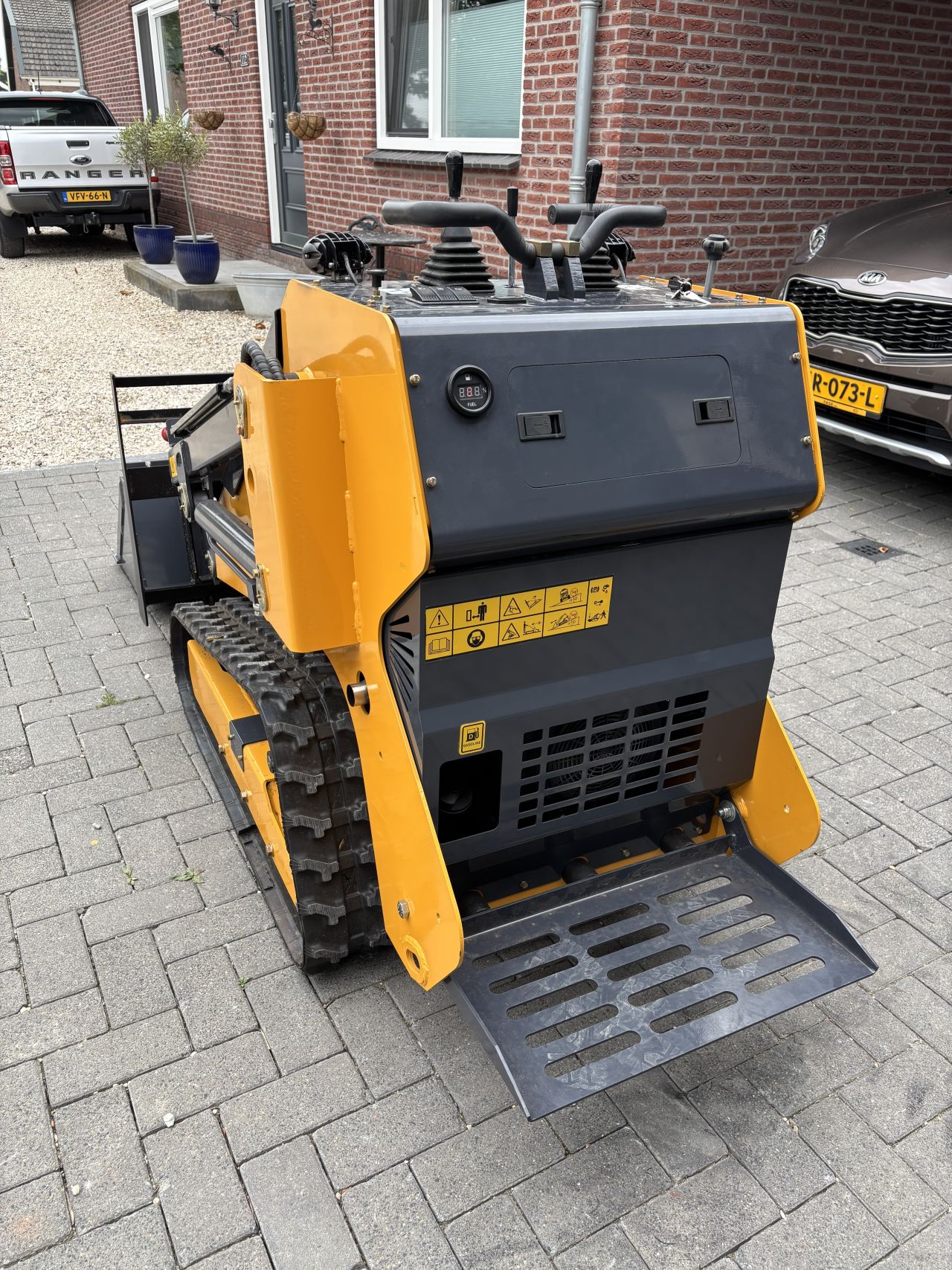 Schranklader skid steer