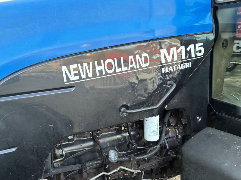 New Holland M 115/8260