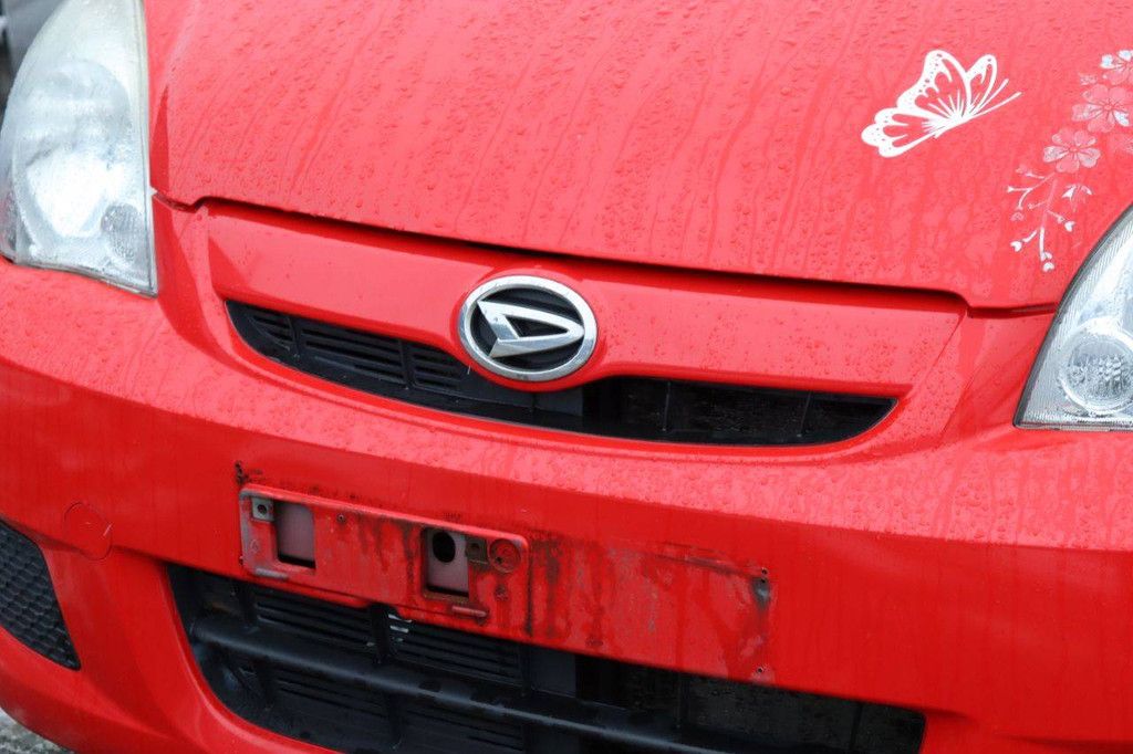 Pkw Daihatsu Cuore Benzin 69 PS 2008 (Marge)