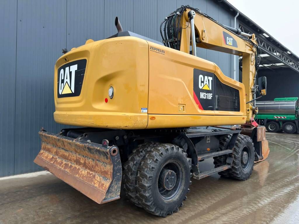 CAT M318F