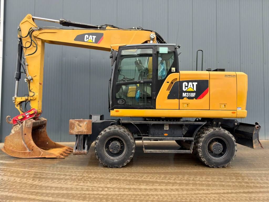 CAT M318F
