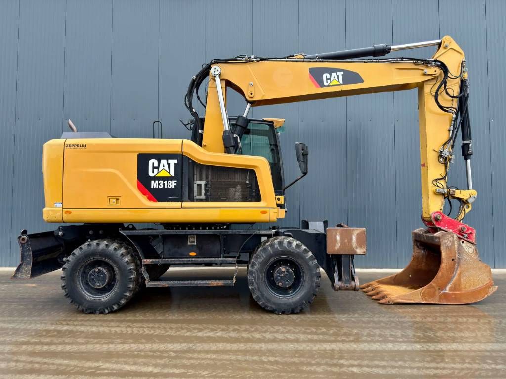 CAT M318F