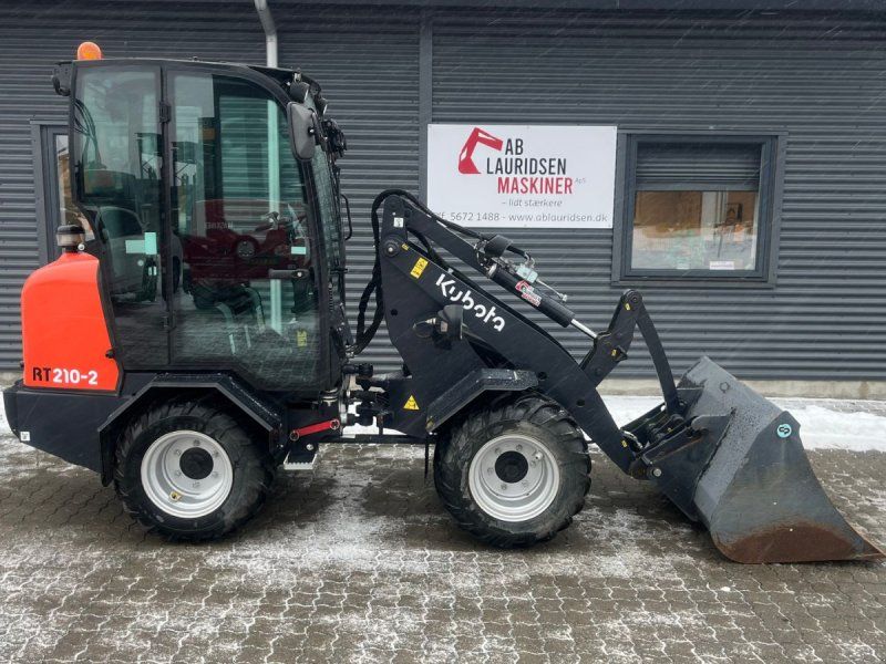 Kubota RT210-2 Med lukket kabine kun kørt 242Timer