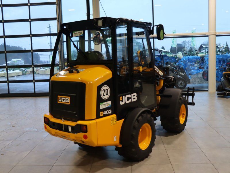 JCB 403 Agri 26PS Hoflader Symbolfotos