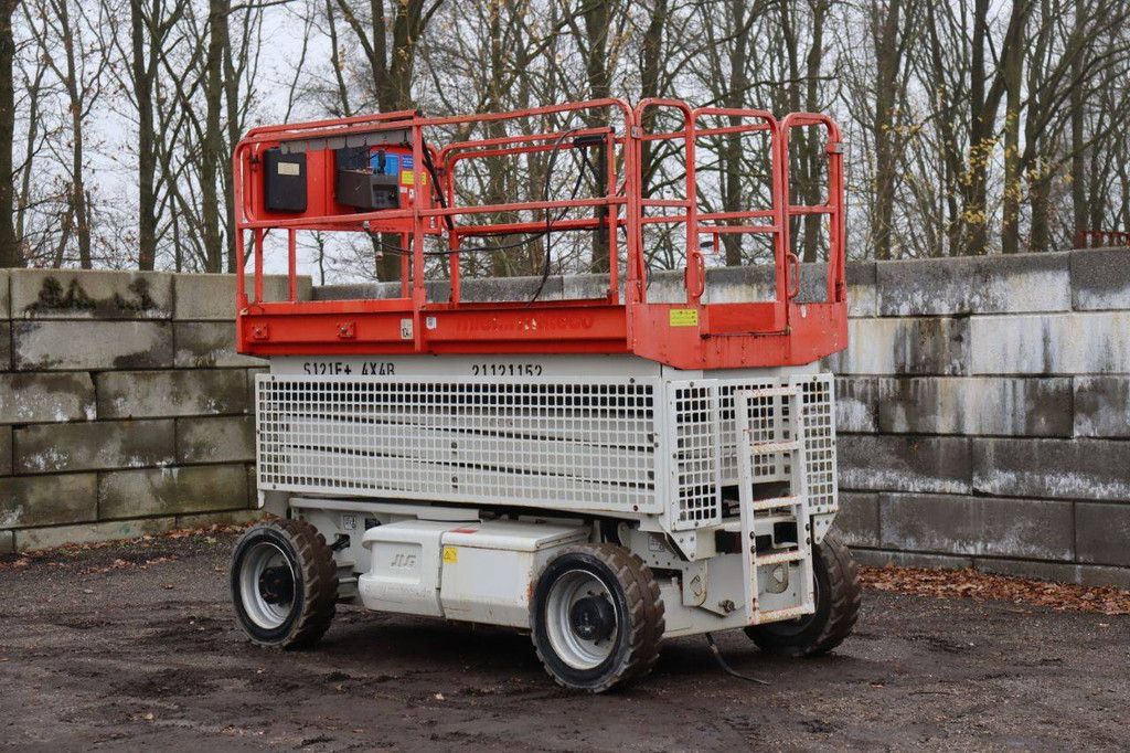 Scissor lift JLG M3369 Electric+Diesel 12m 2013