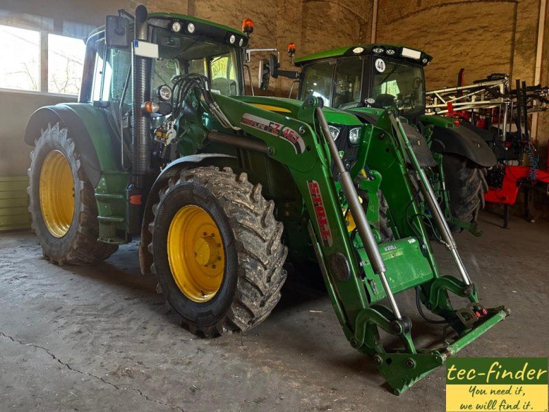 John Deere 6115 M / FL Stoll ProfLine 45.1
