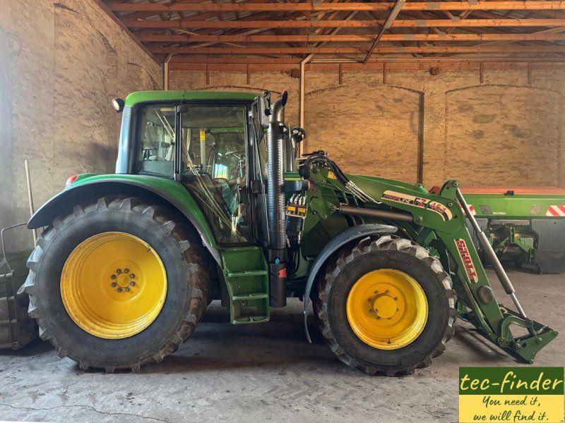 John Deere 6115 M / FL Stoll ProfLine 45.1