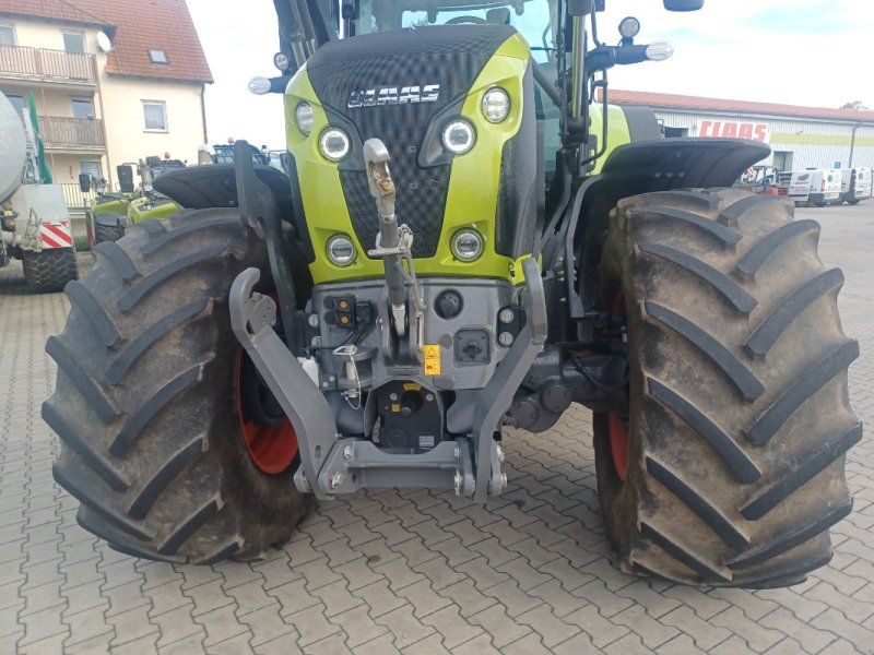 Claas Axion 870 Cmatic Cebis + MX Frontlader T 418