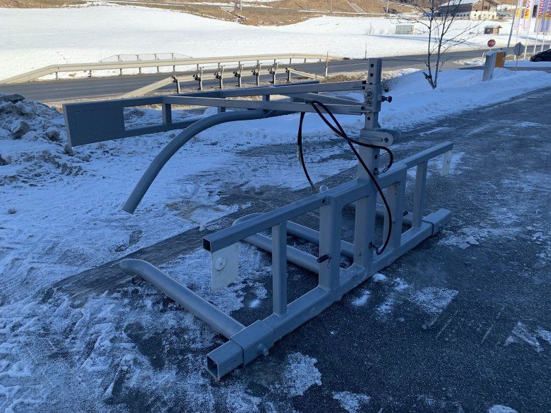 Ballentransporter mit Niederhalter