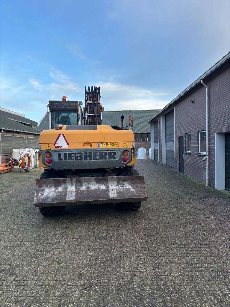 Liebherr 314 mobiele kraan graafmachine