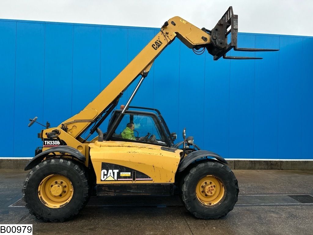 Caterpillar TH 330b 7,20 MTR, 3175 KG