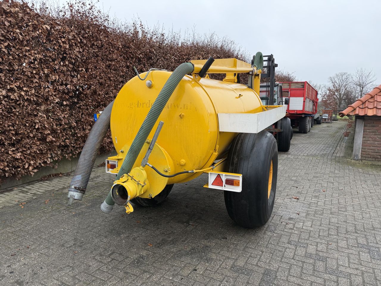 Watertank met hydraulische watergeef arm !