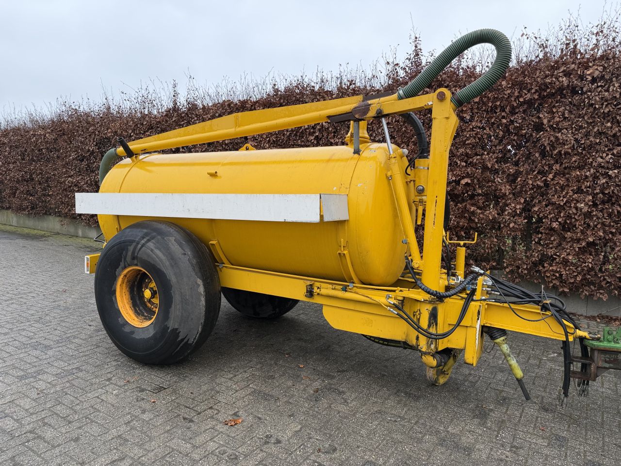 Watertank met hydraulische watergeef arm !