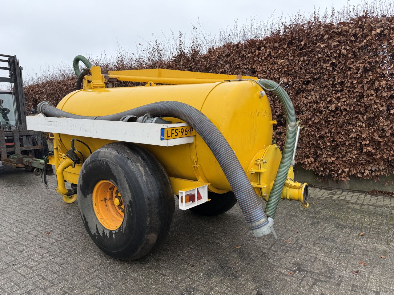 Watertank met hydraulische watergeef arm !