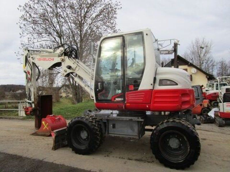 Takeuchi TB 295W POWERTILT + Schnellw + 3 Löffel