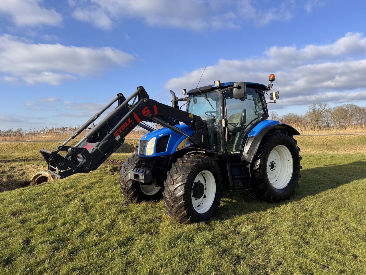 New Holland T6010 met voorlader 2010 6080 uur