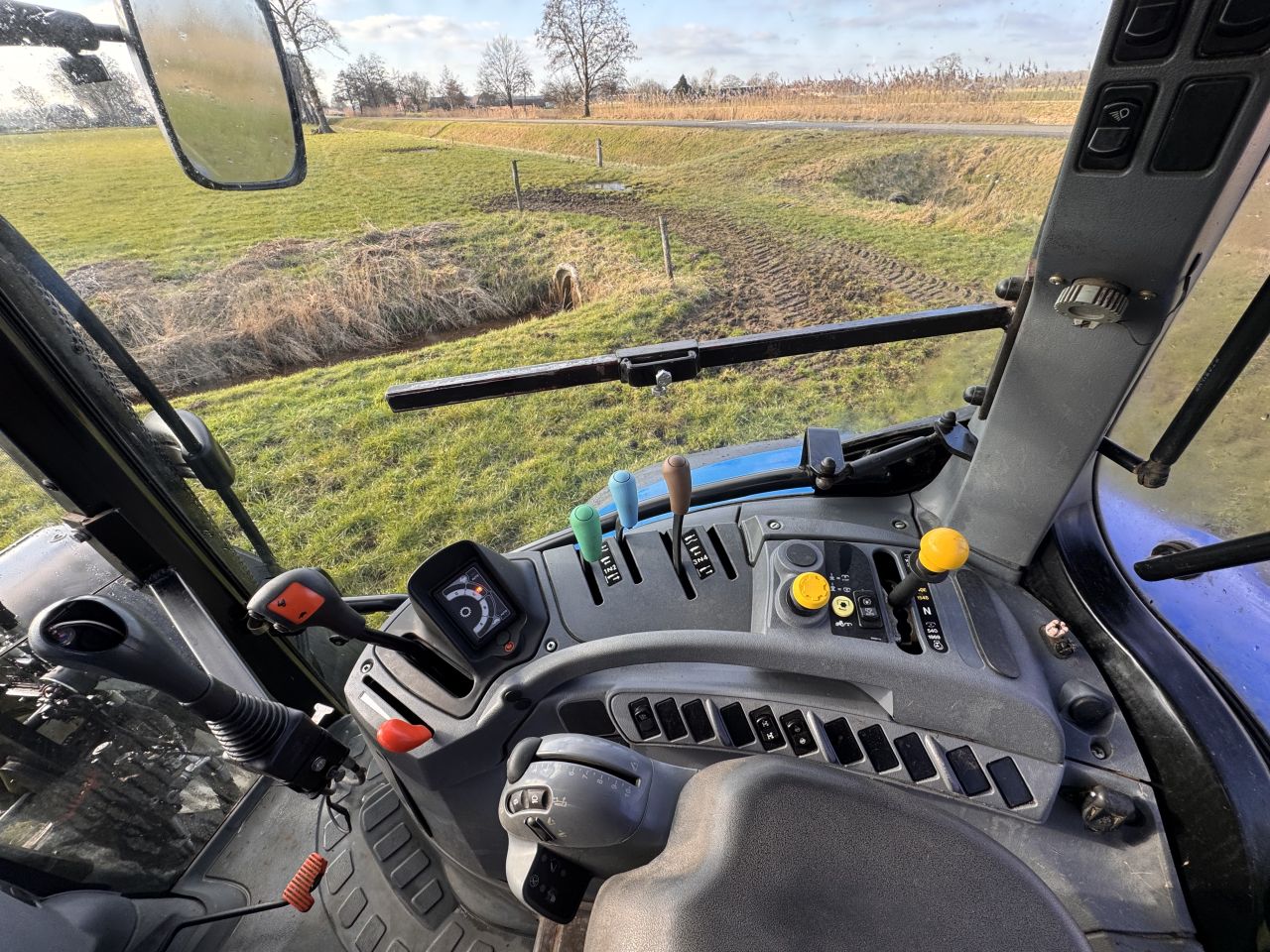 New Holland T6010 met voorlader 2010 6080 uur