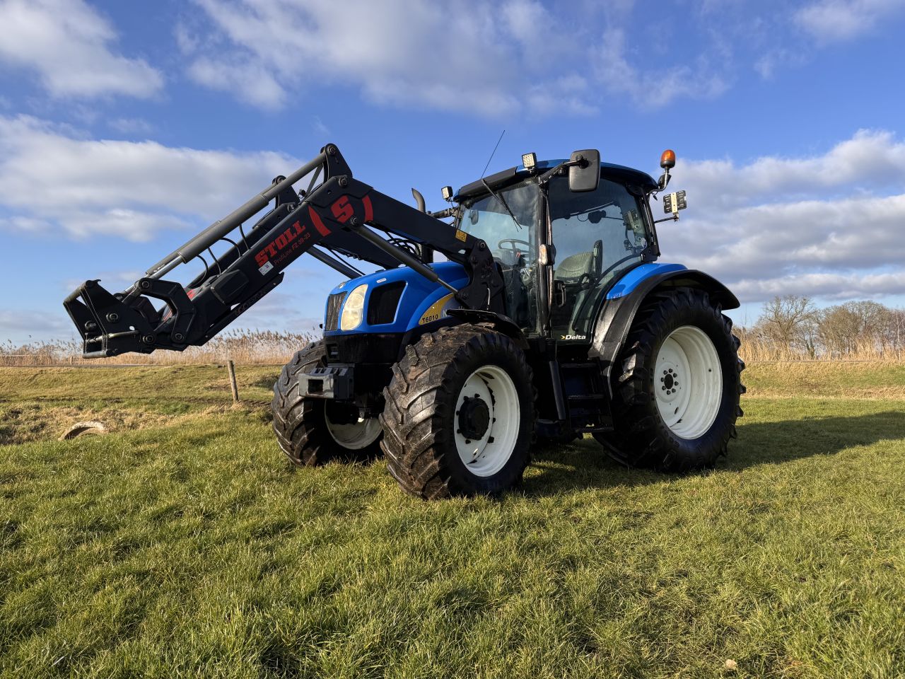 New Holland T6010 met voorlader 2010 6080 uur