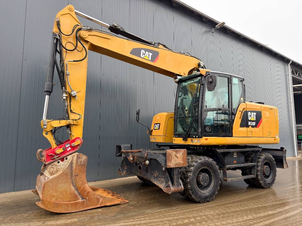 CAT M318F